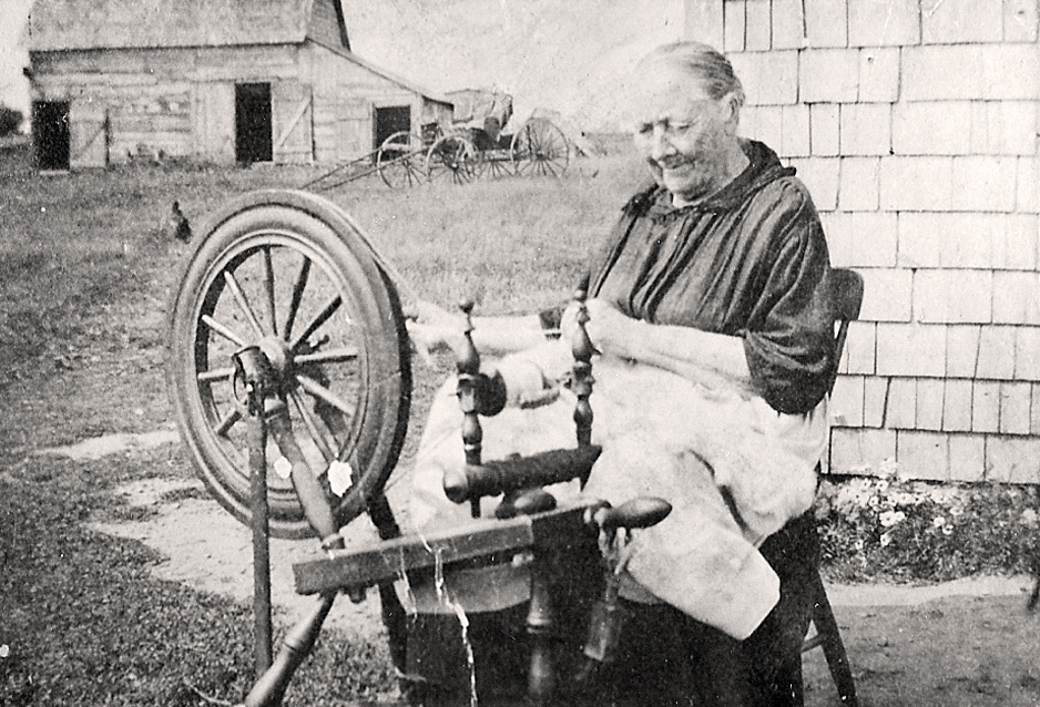 Woman at a spinning wheel